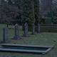 Astrid (Danica Curcic) looks upon a peculiar grave.